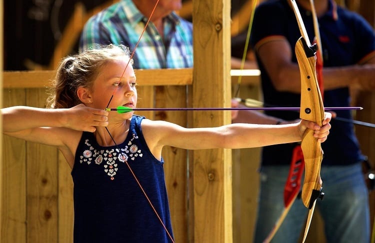 Young Girl Using Archery Bow