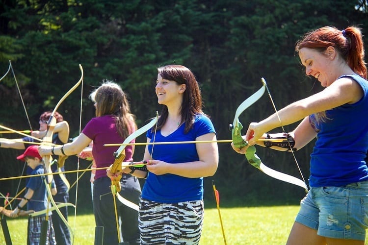 Group Of People On Archery Practice