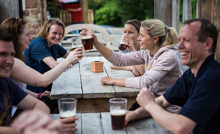 Group Of People Drinking Beer