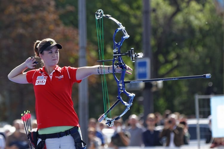 Woman Shooting With Compound Bow