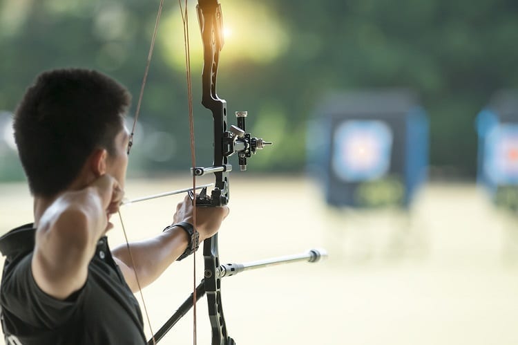 Man Using A Bow