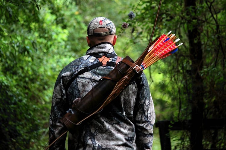 Man Wearing Quiver On Back at Archery Ranges