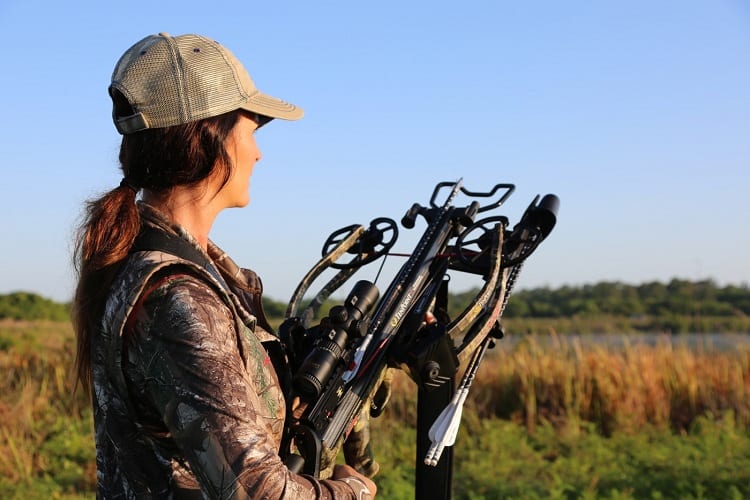 Woman Holding Crossbow